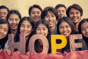 asian people age 16 to 18 with hope word clear dikhe